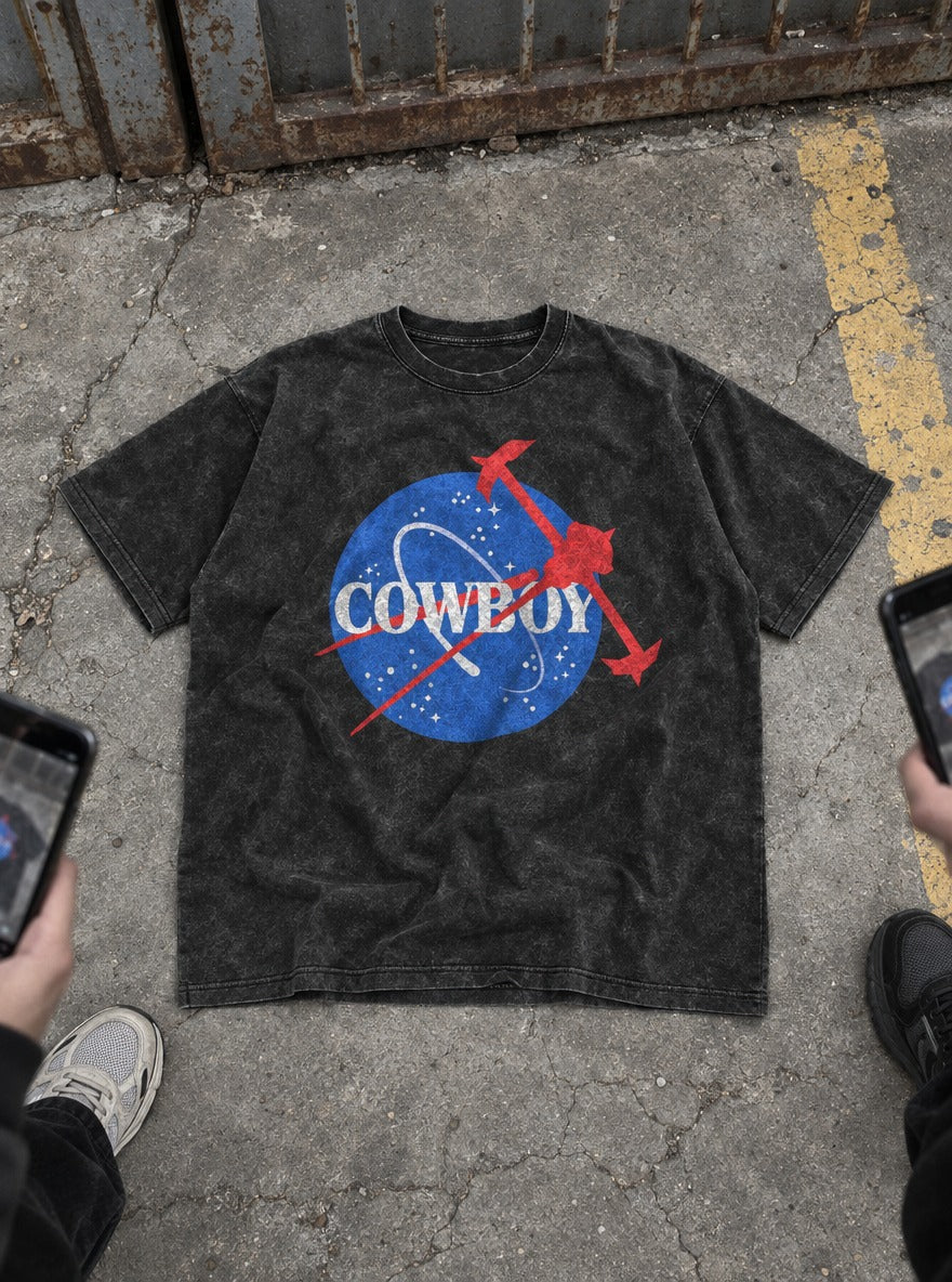 Cowboy C.B. – Black Acid Wash Tee – flat-lay | Meme Tees