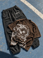Brown Tee & Joggers Combo – Swirl Duel – flat-lay | Demon Slayer