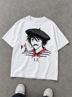 Le D Note – White Tee – flat-lay | Meme Tees