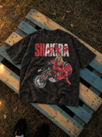 Shakira – Black Acid Wash Tee – flat-lay | Meme Tees